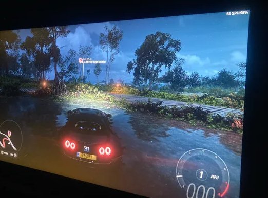 Forza Horizon 5 running on an Acer Nitro gaming laptop with an on-screen FPS and GPU usage overlay