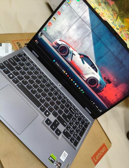 Lenovo LOQ gaming laptop switched on for the first time on top of its box