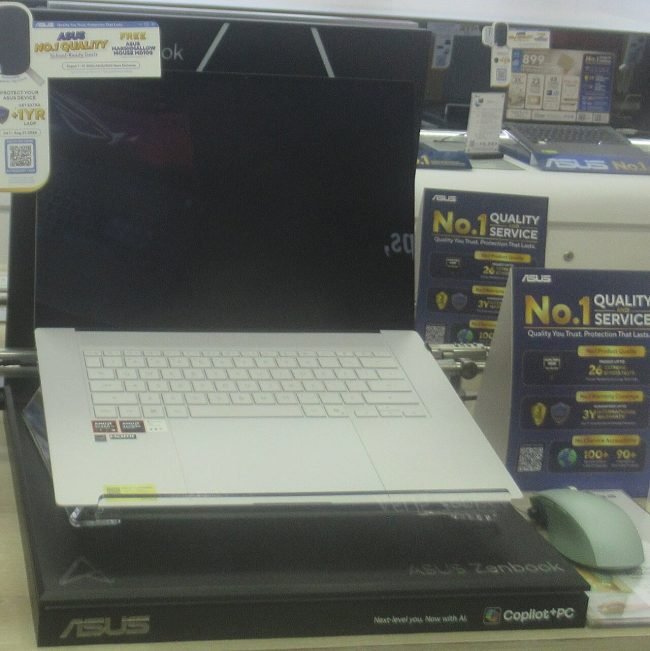 ASUS Zenbook S14 14-inch laptop on a store display