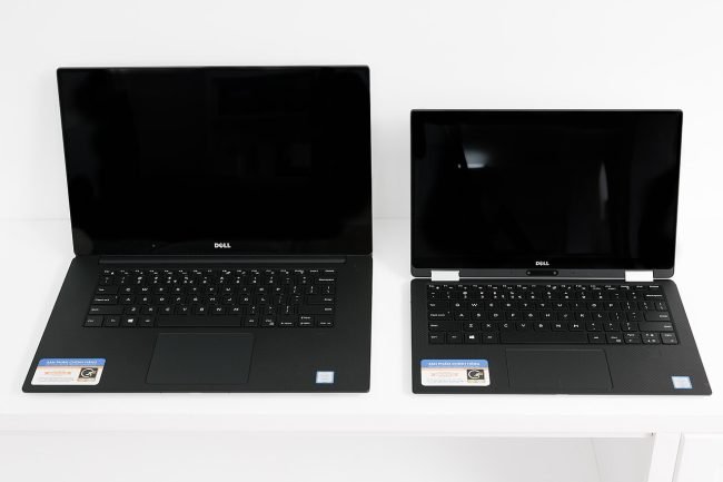 Dell XPS 15 and XPS 13 laptops open side by side